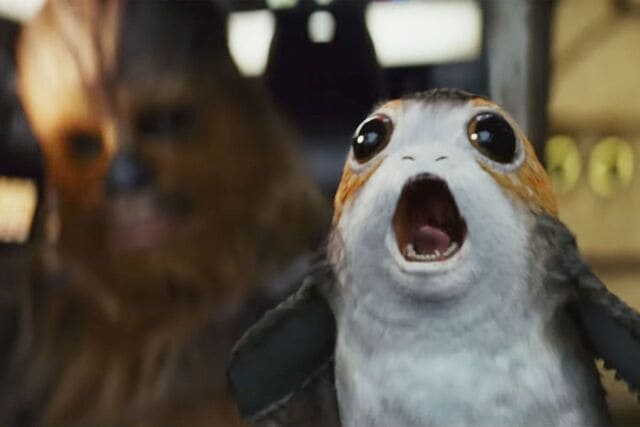 An annoying plush toy called a porg steals the frame and supposedly looks cute.
